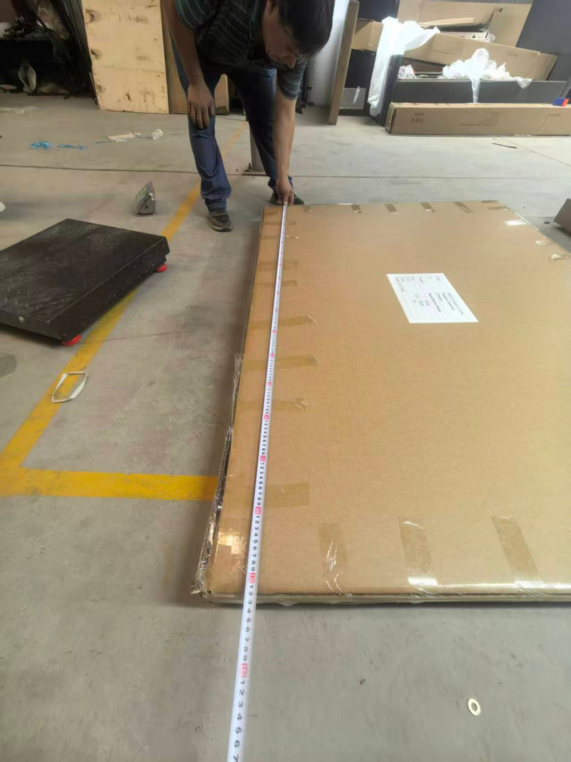 Measuring carton dimensions against spec before assembly
